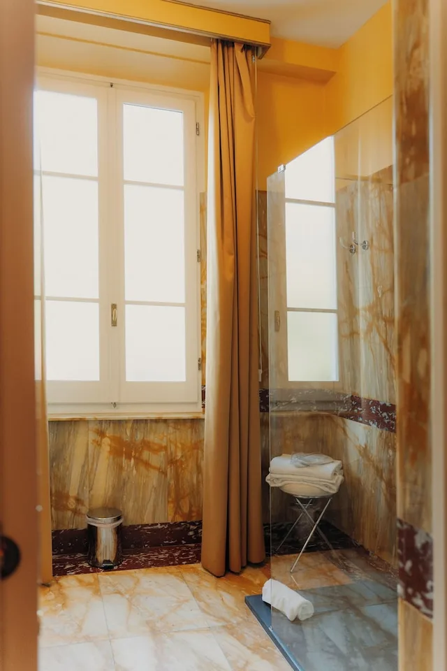 غرفة بريميوم بسرير كينج بشرفة، Palazzo Guiscardo 9/9