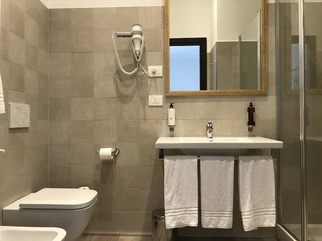 غرفة سوبيريور ثلاثية بسرير مزدوج وسرير فردي، Hotel Bernina 3/9