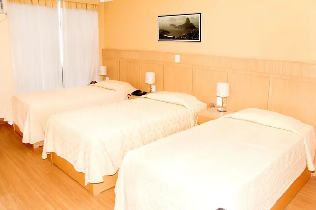 غرفة سوبيريور ثلاثية بسرير مزدوج وسرير فردي، Hotel Atlantico Lapa 1/3