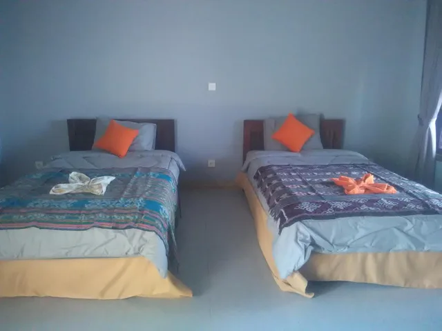 غرفة ديلوكس بسريرين منفصلين بإطلالة على البحر، Ridho Malik Hotel 3/8