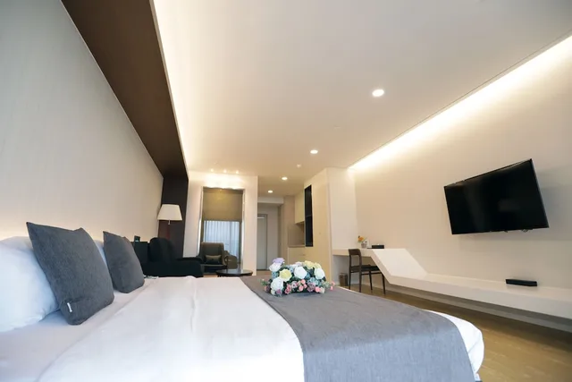 غرفة ديلوكس بسرير كينج، The Qube Resort Jeju 1/3