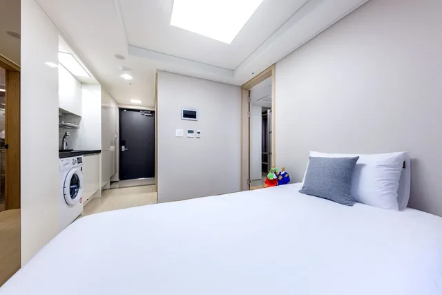 جناح جونيور بسرير مزدوج وسرير فردي بإطلالة على المدينة، Shin Shin Hotel Seogwipo 5/8