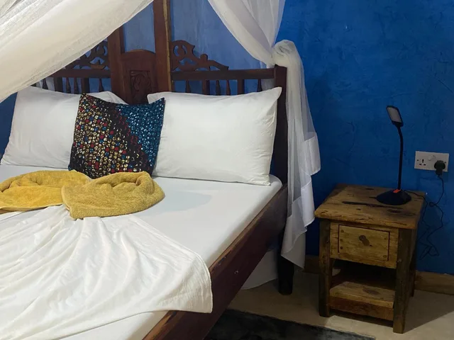 غرفة بسرير مزدوج بإطلالة على الحديقة، Mbuyuni Beach Village 7/10