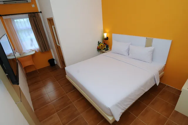سكن مشترك مختلط ديلوكس بسرير مزدوج، RumaRuma Hotel Kenten Palembang 1/2