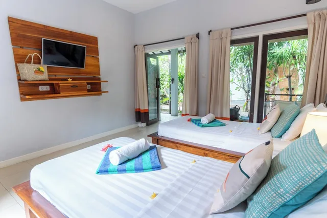غرفة بسريرين منفصلين بإطلالة على الحديقة، Bale Sampan Bungalows 9/10