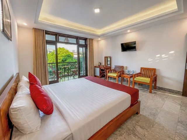 غرفة ديلوكس بسرير كوين بإطلالة على الحديقة بشرفة، Trendy Life Villa 4/10