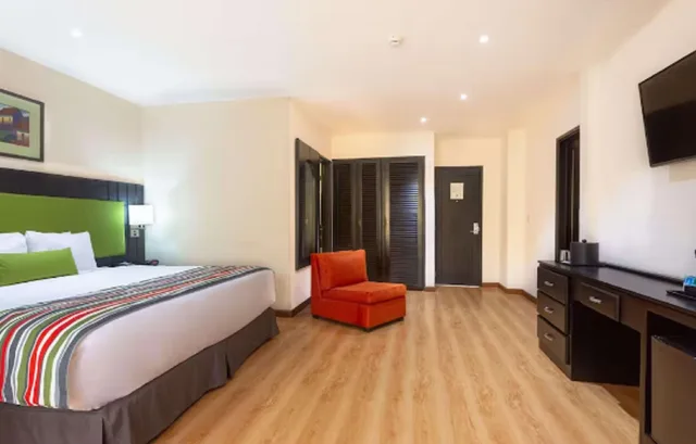 غرفة قياسية بسرير كينج، Country Inn & Suites By Radisson San Jose Aeropuerto Costa Rica 1/3