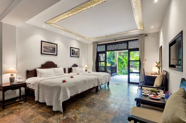 Classic, Triple, 1 King and 1 Single Beds, Garden View, Hoi An Ancient House Resort And Spa 1/4