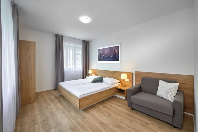 شقة كومفورت بسرير كوين بغرفة نوم واحدة مع أريكة بمطبخ، Downtown Suites Belohorska 2/3