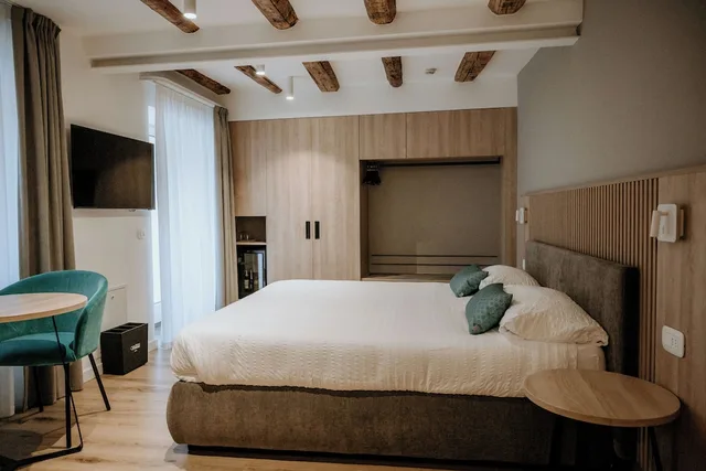 غرفة جونيور بسرير كينج وسرير فردي، Hotel Garni Venezia 2/10