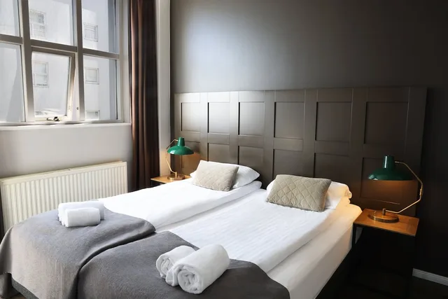 غرفة عائلية بسرير مزدوج وسريرين منفصلين، Fosshotel Baron 4/8