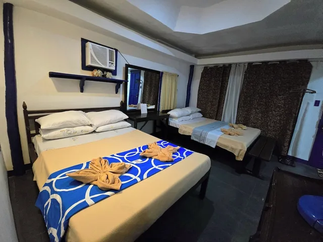 غرفة سوبيريور رباعية بسريرين مزدوجين بإطلالة على البحر بشرفة، Islandfront Cottages 2/10