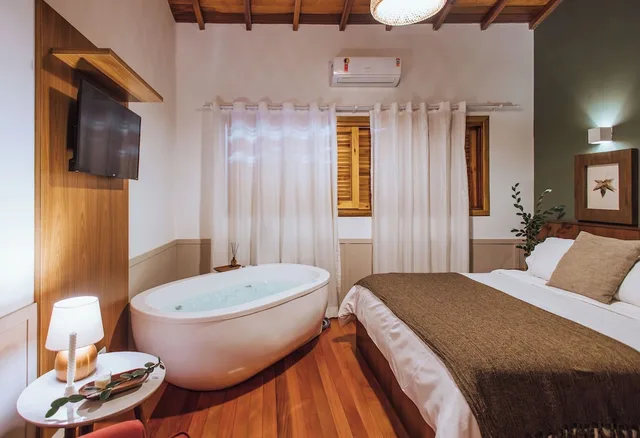 غرفة ديلوكس بسرير كوين بحوض جاكوزي، Hotel Pousada Bella Locanda 5/9