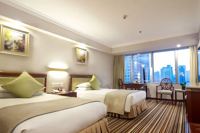 غرفة ديلوكس بسريرين منفصلين بإطلالة على المدينة، Jin Jiang Tower Hotel 1/10