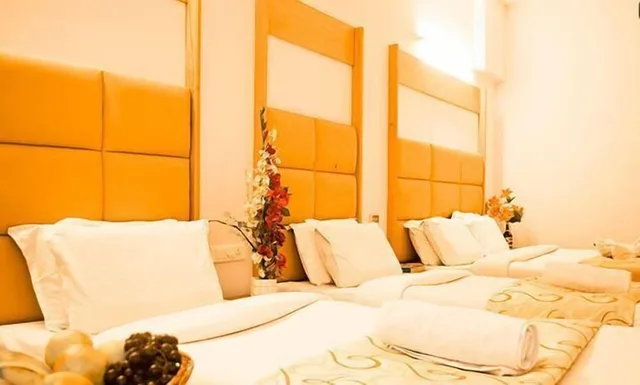 غرفة قياسية رباعية بسريرين كوين، HOTEL RAJADHANE 9/9