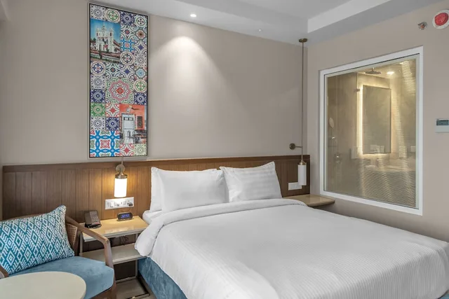 غرفة ديلوكس بإطلالة على المسبح بشرفة مفردة بسرير كوين، Fairfield by Marriott Goa Calangute Village 3/9