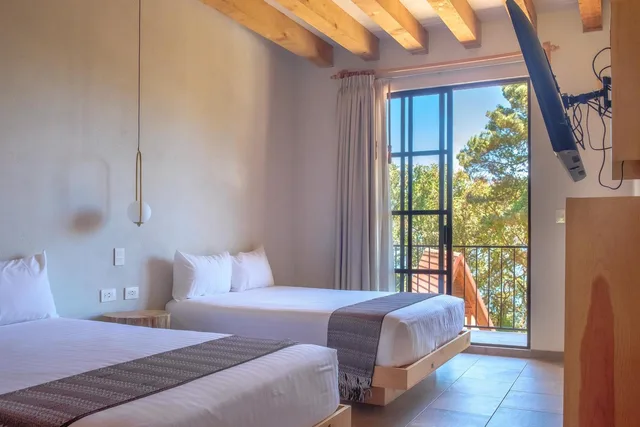 غرفة بسريرين منفصلين، Zirahuen Forest And Resort 3/5