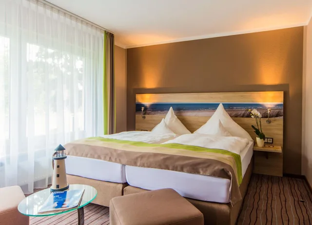 غرفة ثلاثية بسريرين منفصلين مع أريكة، Ambient Hotel Am Europakanal 2/2