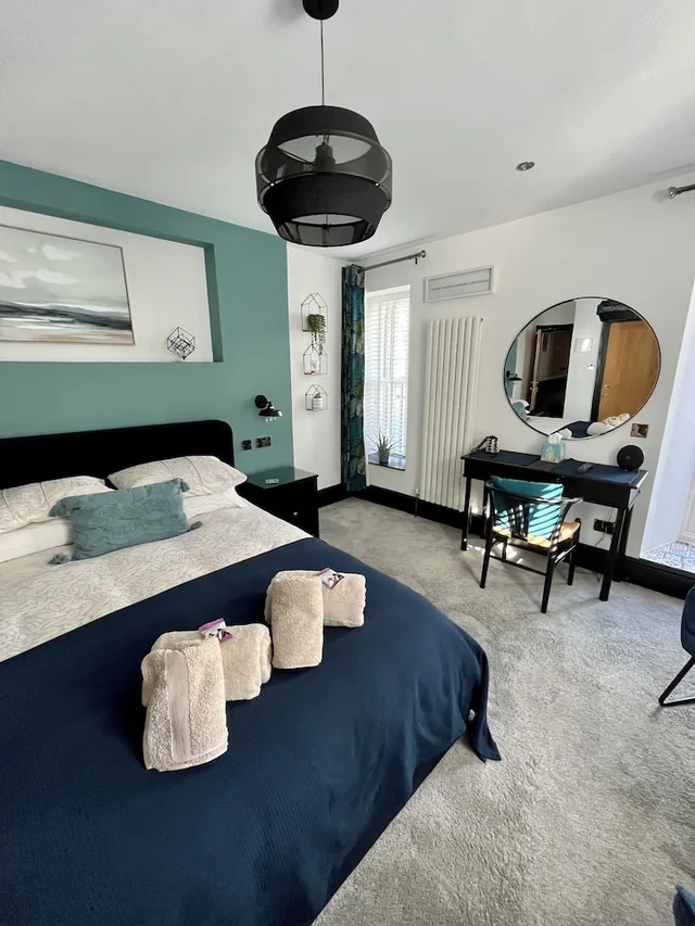 غرفة ديلوكس بسرير كينج وسرير كوين، Lazy Waves Boutique B&B 2/5
