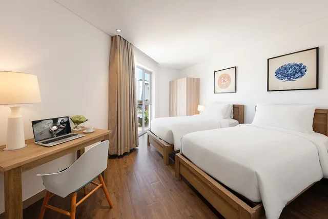 جناح بريميير بسرير كينج وسريرين منفصلين بإطلالة على البحر بغرفتي نوم، The Pearl Hoi An 6/10
