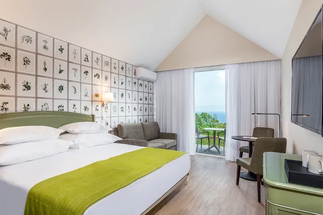 Studio, Double Bed, Lateral Side Sea View, Sofa، Pestana Quinta Do Arco 2/10