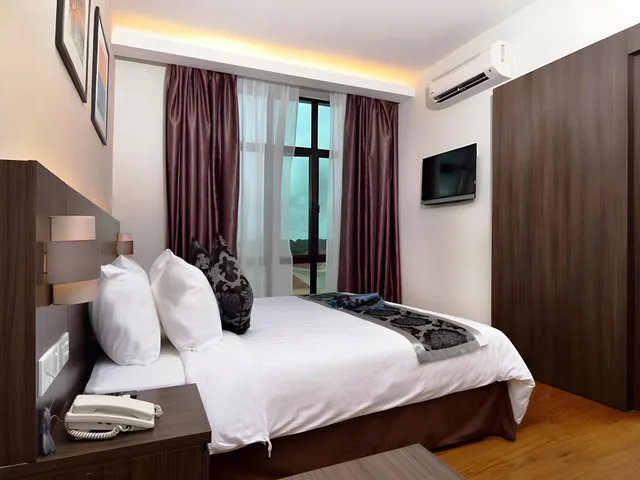 جناح بسرير كينج مع أريكة، Holiday Villa Hotel and Suites Kota Bharu 2/2