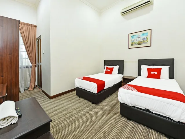 غرفة ديلوكس بسريرين منفصلين، Capital O 90434 Marmoris House 2/2