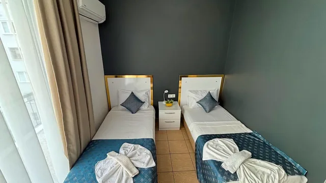 غرفة قياسية بسريرين منفصلين، Moonbow Beach Hotel 4/7