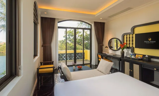غرفة سيغنتشر بسرير مزدوج بإطلالة على النهر، Nesta Hoi An Resort and Spa 1/1