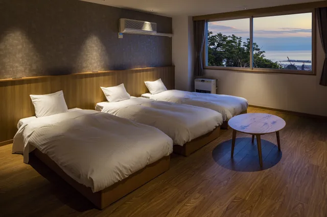 غرفة أساسية ثلاثية بثلاثة أسرّة، Shiretoko Yuhi No Ataruie Onsen Hostel 2/3