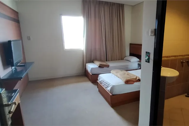 غرفة ديلوكس بسريرين منفصلين، Hotel Bintang Solo 1/2