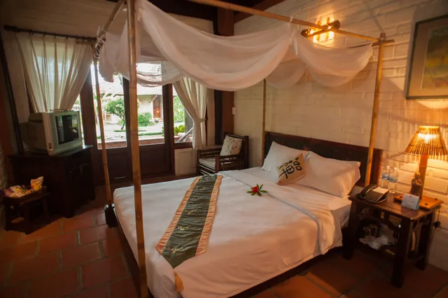 غرفة ديلوكس بسرير كوين بإطلالة على الحديقة، Van Chai Resort 1/2