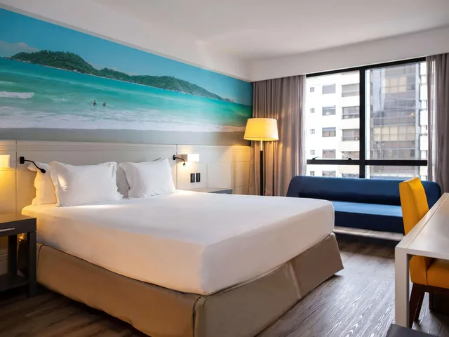 غرفة سوبيريور بسرير كينج بإطلالة جزئية على البحر، Novotel Florianopolis 1/3