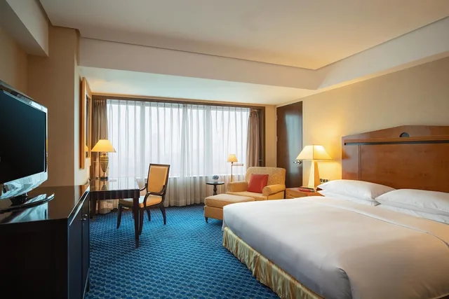 جناح تنفيذي بسرير كينج بغرفة نوم واحدة، Renaissance Tianjin Teda Convention Centre Hotel 1/3
