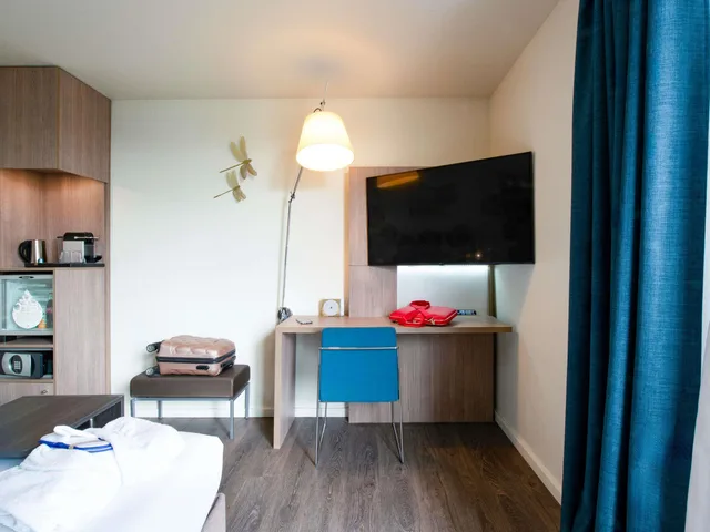 غرفة تنفيذية بسرير مزدوج بشرفة، Novotel Senart Golf de Greenparc 7/9
