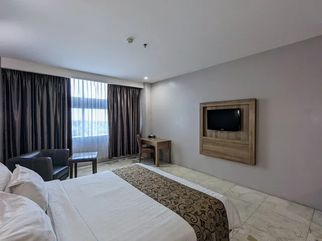 غرفة تنفيذية بسرير كوين، Manna Hotel Pematangsiantar 1/3