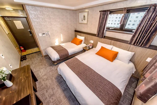 غرفة ديلوكس بسرير مزدوج وسرير فردي، Index Hotel J Dream Jeju 1/6