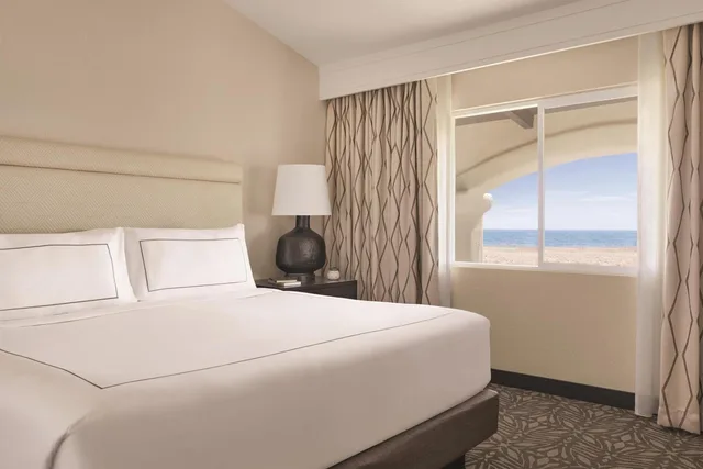 Suite, King Bed, Ocean Front, Sofa، Zachari Dunes on Mandalay Beach, Curio Collection by Hilton 1/4