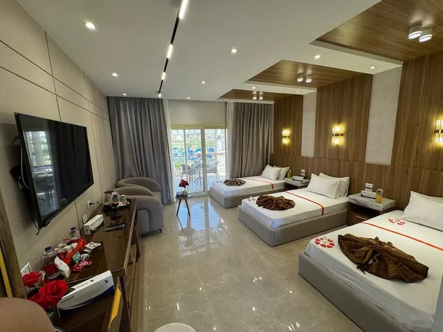 شاليه ثلاثي بثلاثة أسرّة بإطلالة على المسبح، Ramage Hotel & Resort 1/7