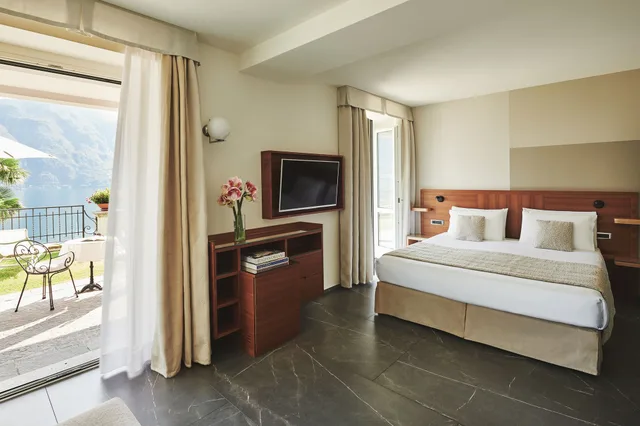 Garden, Superior, Queen Bed, Lake View، Belvedere 1/4