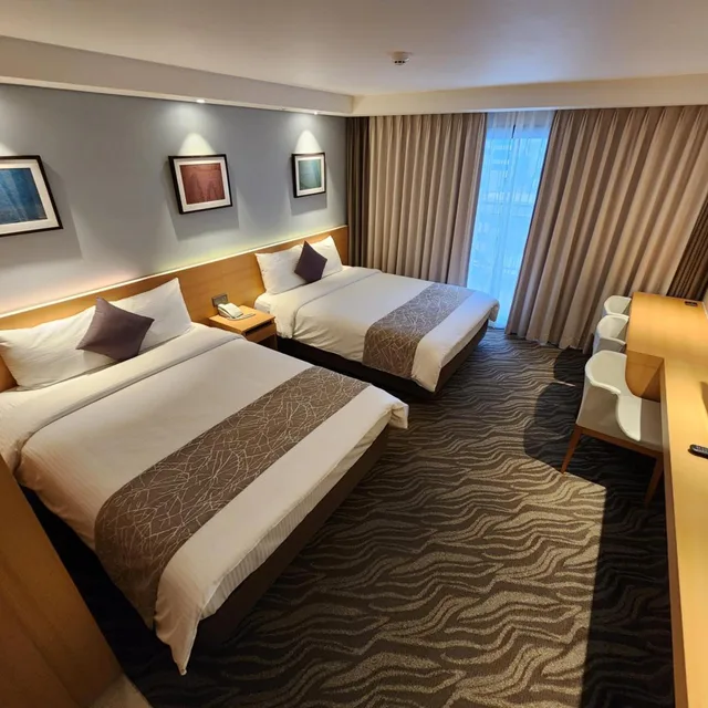 غرفة عائلية بسريرين منفصلين بشرفة، Seogwipo JS Hotel 8/10