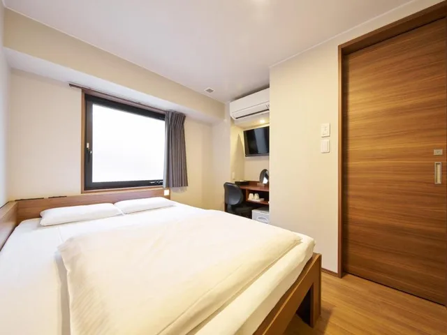 غرفة يابانية قياسية بفراش فوتون وسرير مزدوج، Hotel Meldia Osaka Higobashi 1/10