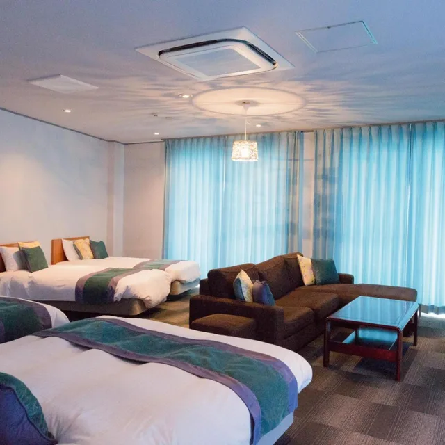 غرفة رباعية، Hotel Caretta Amami 1/2