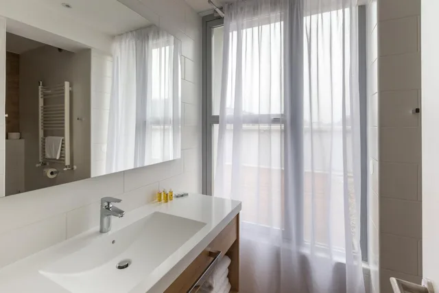 جناح ديلوكس بسريرين منفصلين مع أريكة، M hotel Ljubljana 3/3