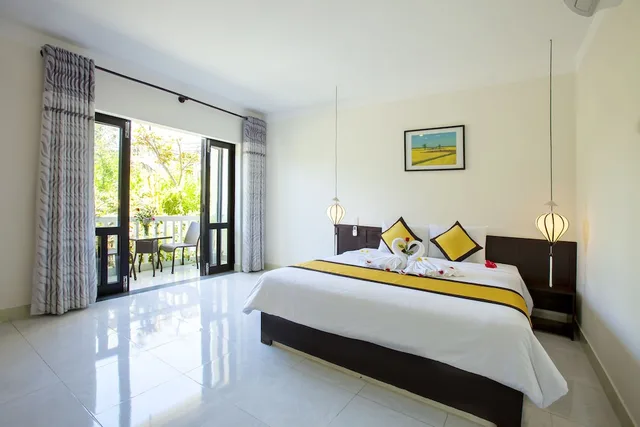غرفة ديلوكس بسرير كوين بإطلالة على الفناء، Phuc Thao Villa 1/3