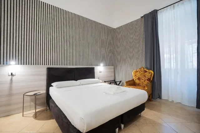 غرفة كومفورت رباعية بسرير كوين وسريرين منفصلين، Hotel Trieste 1/7