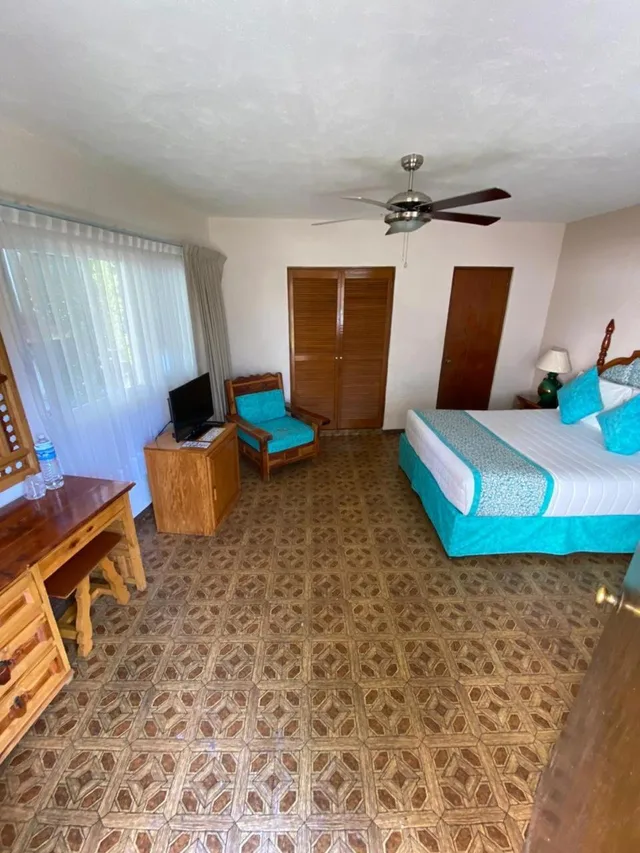 غرفة قياسية بسرير كينج، Hotel Quinta las Flores 3/4
