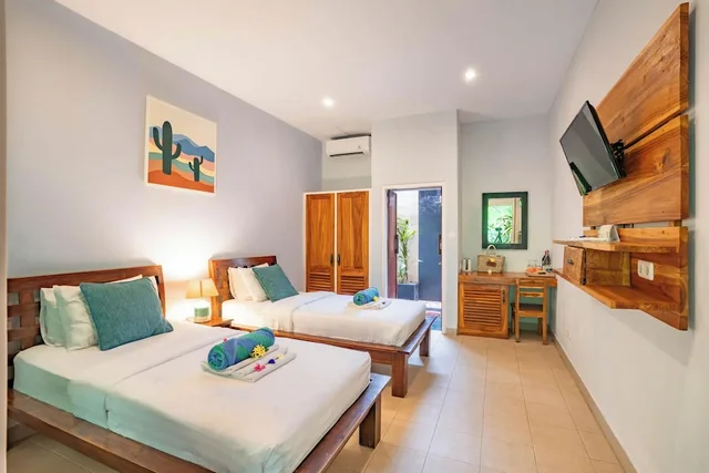 غرفة بسريرين منفصلين بإطلالة على الحديقة، Bale Sampan Bungalows 7/10