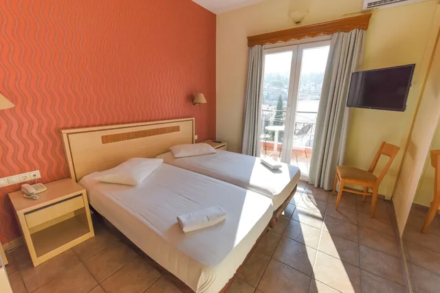 غرفة كومفورت بإطلالة جزئية على البحر، Samos City Hotel 1/4