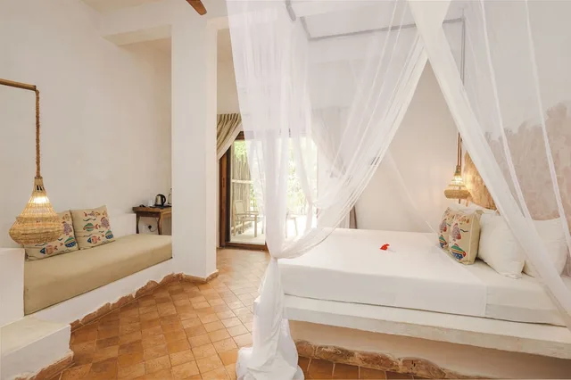 غرفة ديلوكس ثلاثية بسرير كينج وسرير فردي بإطلالة على الحديقة، Mvuvi Boutique Resort 5/10